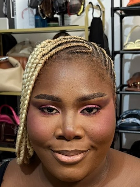 Bold pink glam eye makeup with blonde braided hair